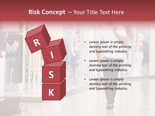 A Man Walking Down A Shopping Mall Holding A Shopping Bag PowerPoint Template