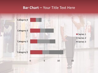 A Man Walking Down A Shopping Mall Holding A Shopping Bag PowerPoint Template