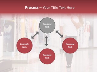 A Man Walking Down A Shopping Mall Holding A Shopping Bag PowerPoint Template