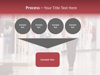 A Man Walking Down A Shopping Mall Holding A Shopping Bag PowerPoint Template
