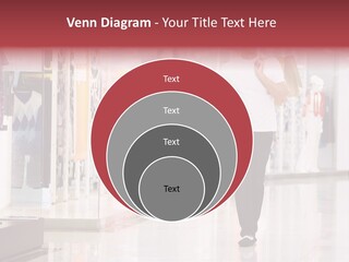 A Man Walking Down A Shopping Mall Holding A Shopping Bag PowerPoint Template