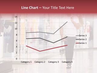 A Man Walking Down A Shopping Mall Holding A Shopping Bag PowerPoint Template