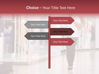 A Man Walking Down A Shopping Mall Holding A Shopping Bag PowerPoint Template