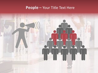 A Man Walking Down A Shopping Mall Holding A Shopping Bag PowerPoint Template