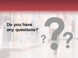 A Man Walking Down A Shopping Mall Holding A Shopping Bag PowerPoint Template