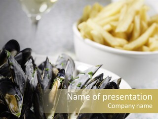 A Plate Of Mussels Next To A Bowl Of Fries PowerPoint Template