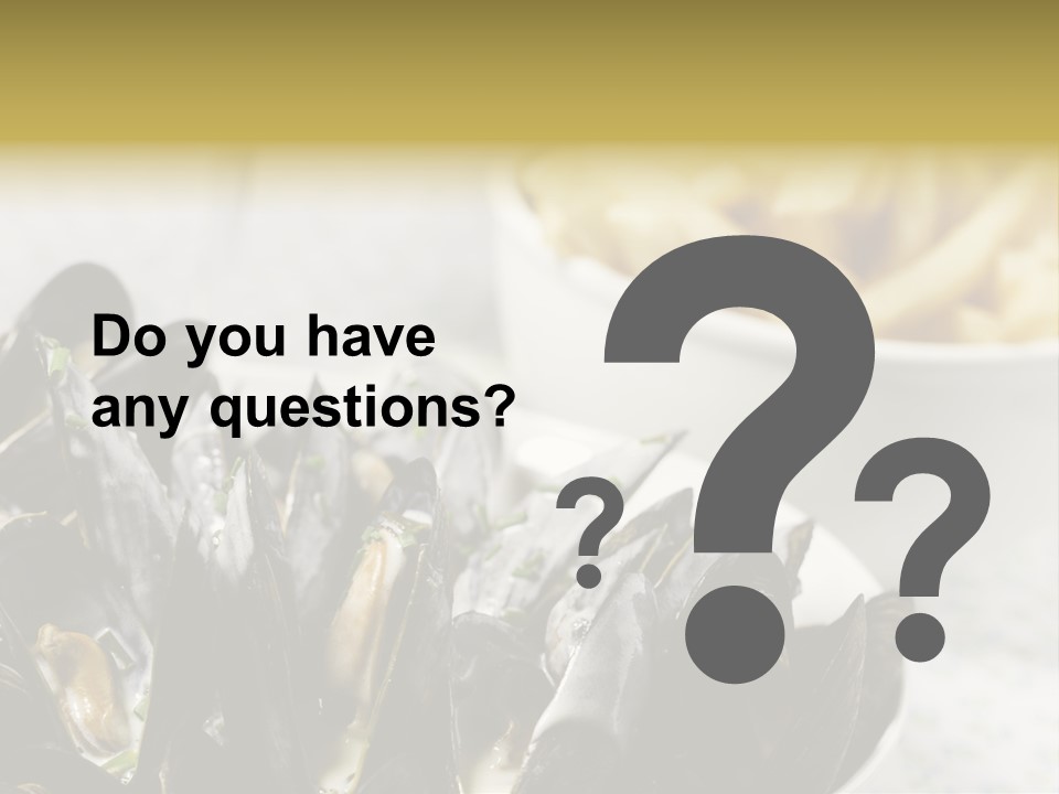 A Plate Of Mussels Next To A Bowl Of Fries PowerPoint Template