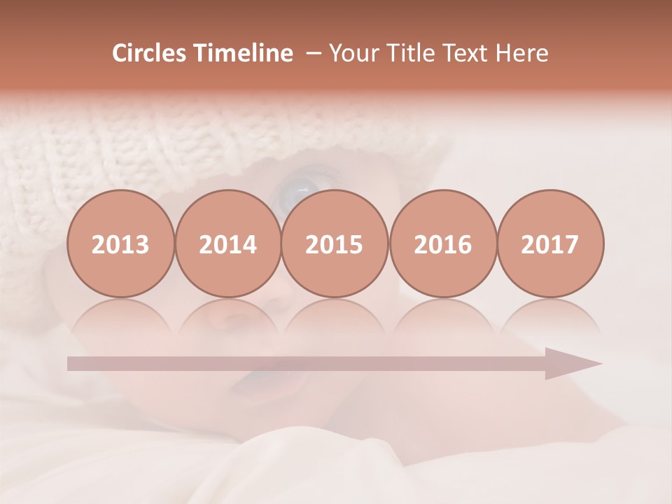 A Baby Wearing A White Knitted Hat With Blue Eyes PowerPoint Template