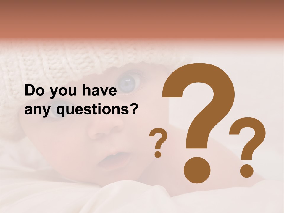 A Baby Wearing A White Knitted Hat With Blue Eyes PowerPoint Template