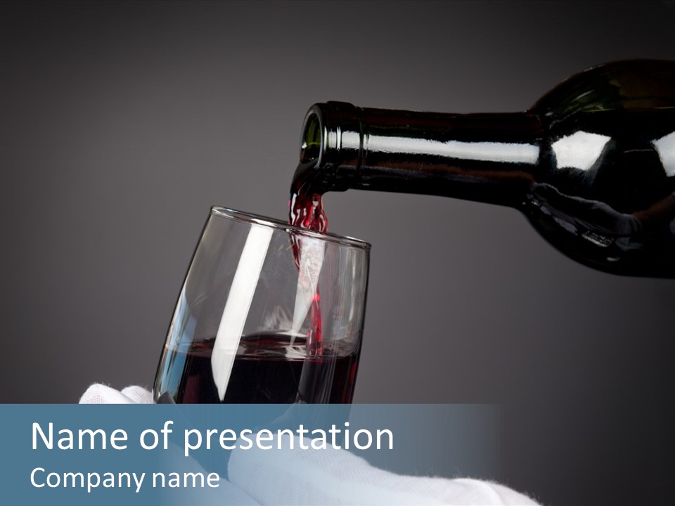 A Bottle Of Wine Being Poured Into A Glass PowerPoint Template