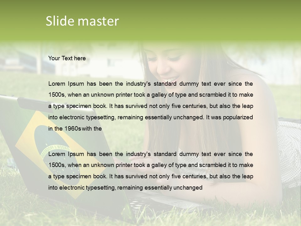 A Woman Laying On The Grass Using A Laptop Computer PowerPoint Template