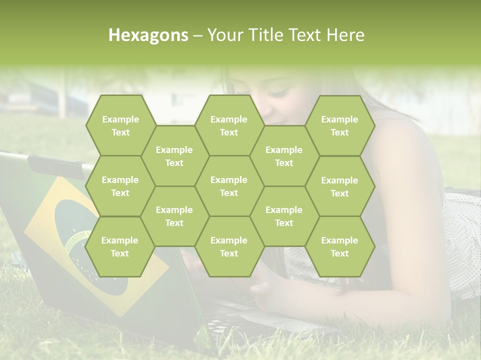 A Woman Laying On The Grass Using A Laptop Computer PowerPoint Template