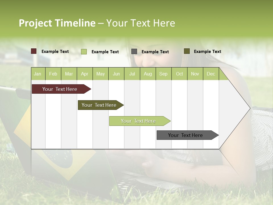 A Woman Laying On The Grass Using A Laptop Computer PowerPoint Template