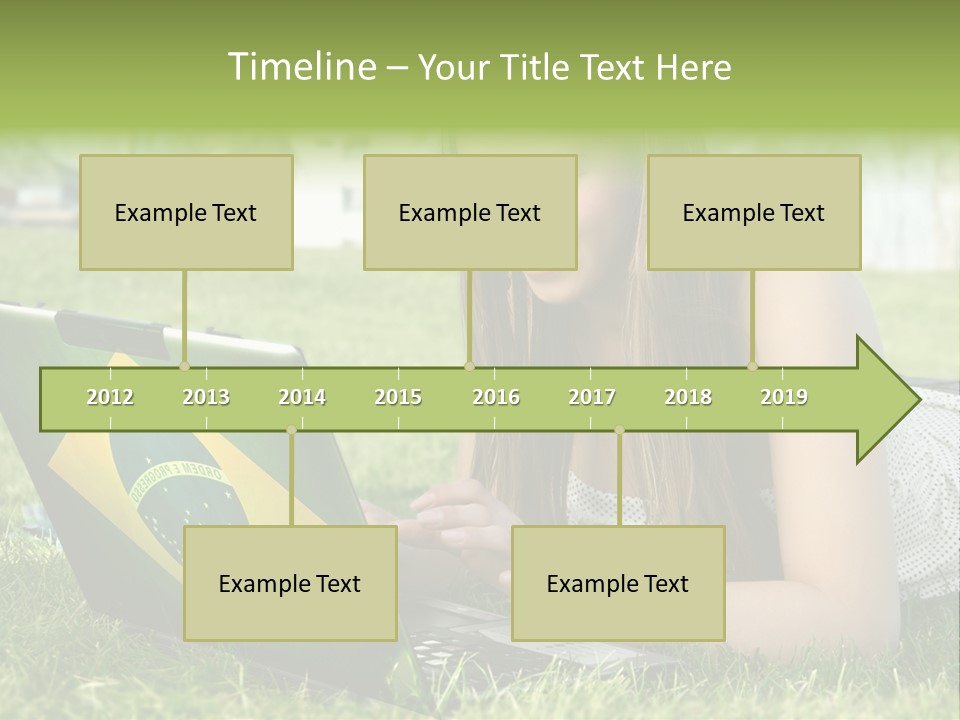 A Woman Laying On The Grass Using A Laptop Computer PowerPoint Template