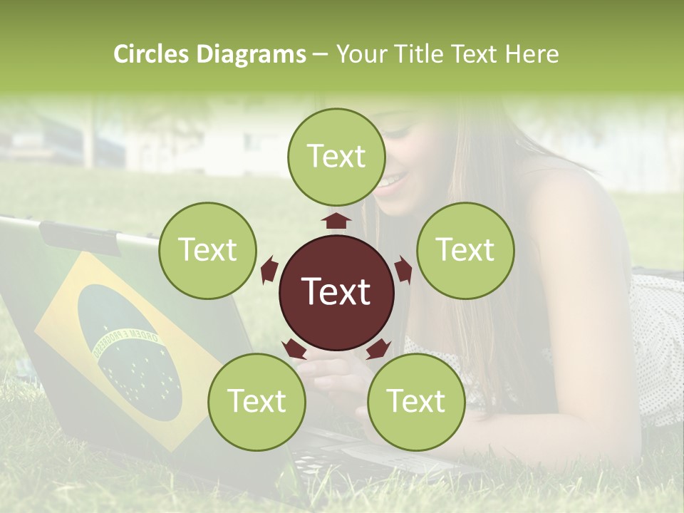 A Woman Laying On The Grass Using A Laptop Computer PowerPoint Template