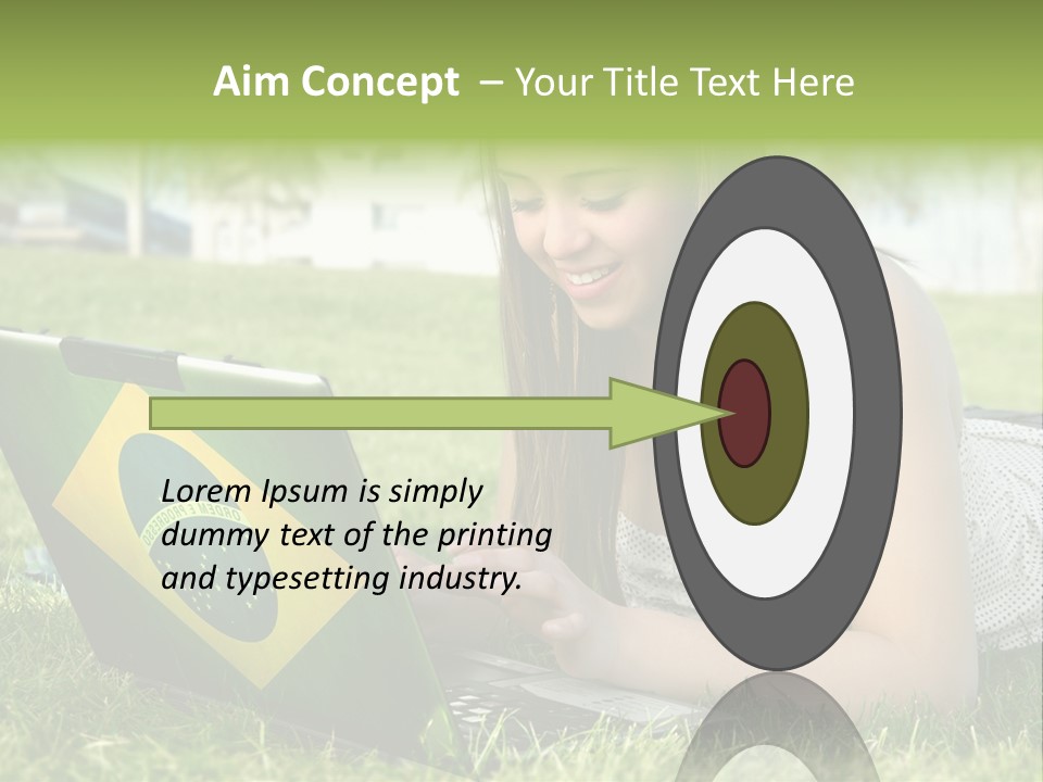 A Woman Laying On The Grass Using A Laptop Computer PowerPoint Template