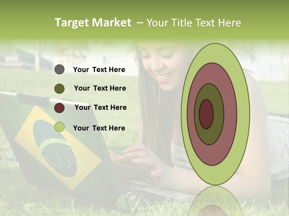 A Woman Laying On The Grass Using A Laptop Computer PowerPoint Template