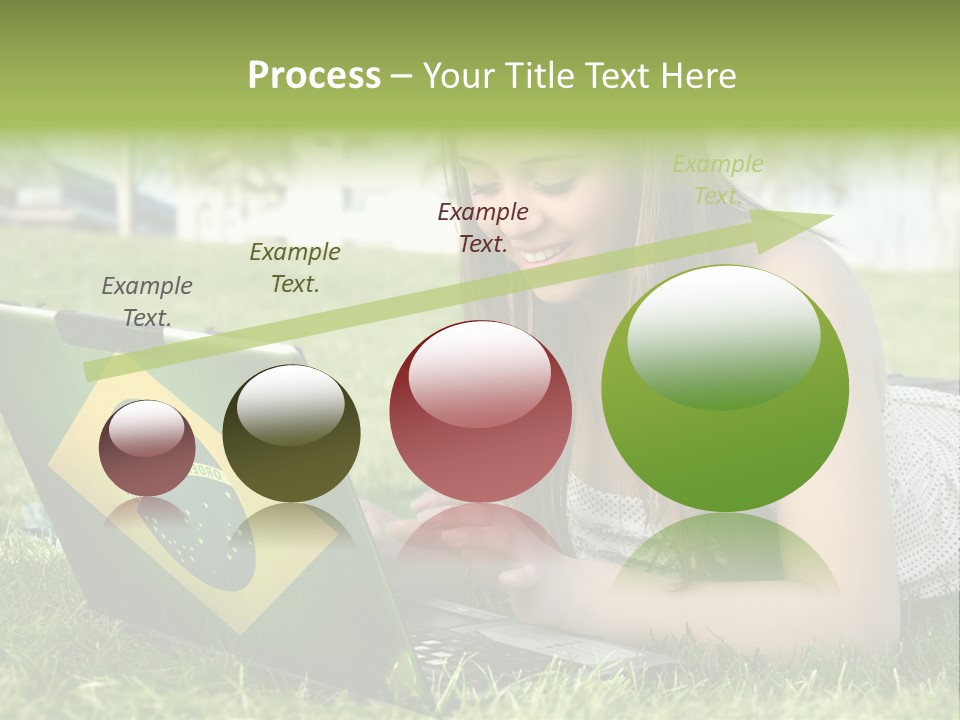 A Woman Laying On The Grass Using A Laptop Computer PowerPoint Template