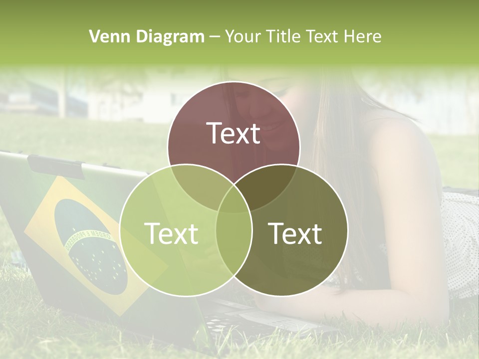 A Woman Laying On The Grass Using A Laptop Computer PowerPoint Template