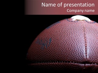 An Image Of A Football On A Black Background PowerPoint Template
