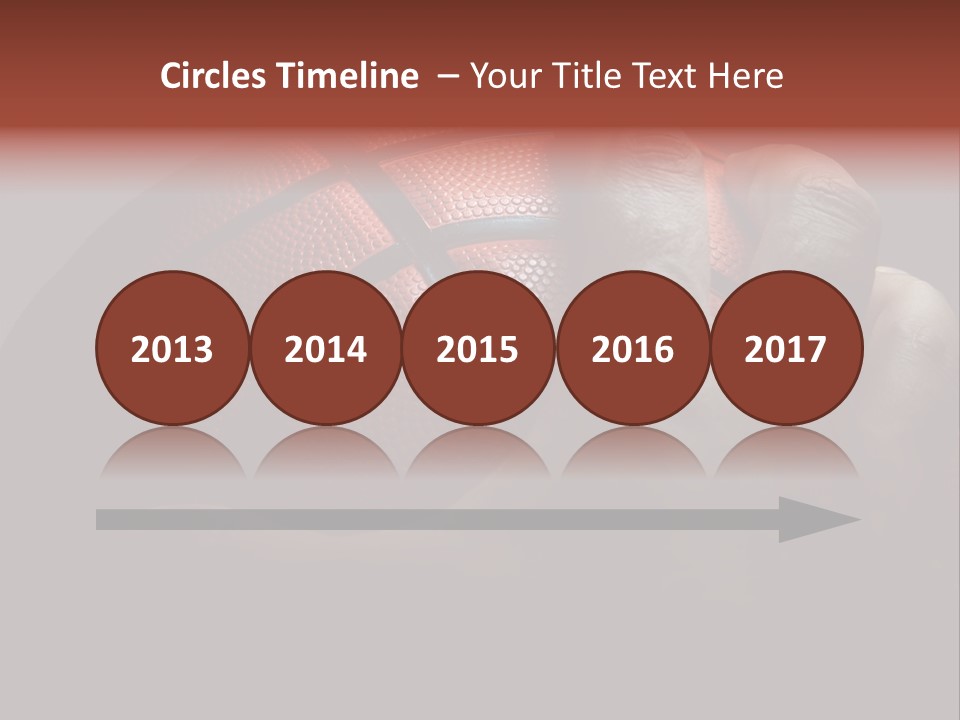 A Person Holding A Basketball In Their Hand PowerPoint Template