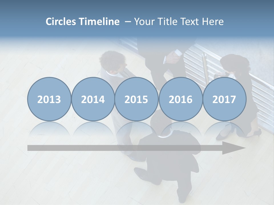 A Group Of People Standing Around A Wooden Floor PowerPoint Template