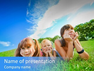 A Group Of Children Laying In The Grass PowerPoint Template