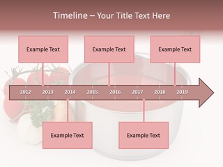 A Pot Of Tomato Soup Next To Some Vegetables PowerPoint Template