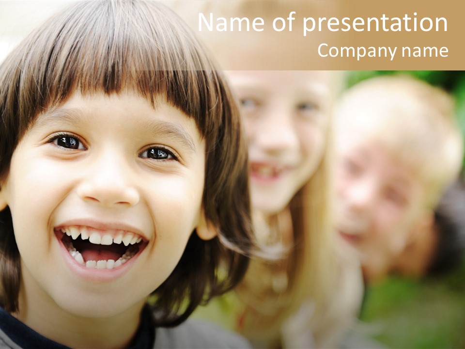 A Group Of Children Are Smiling For The Camera PowerPoint Template