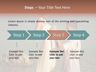 A Man And Woman Standing On A Beach Holding Hands PowerPoint Template