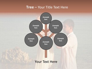 A Man And Woman Standing On A Beach Holding Hands PowerPoint Template