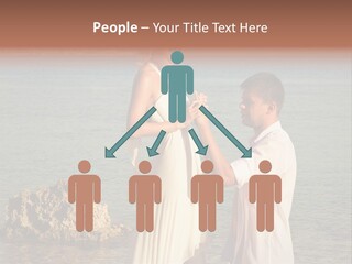 A Man And Woman Standing On A Beach Holding Hands PowerPoint Template