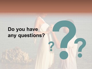 A Man And Woman Standing On A Beach Holding Hands PowerPoint Template