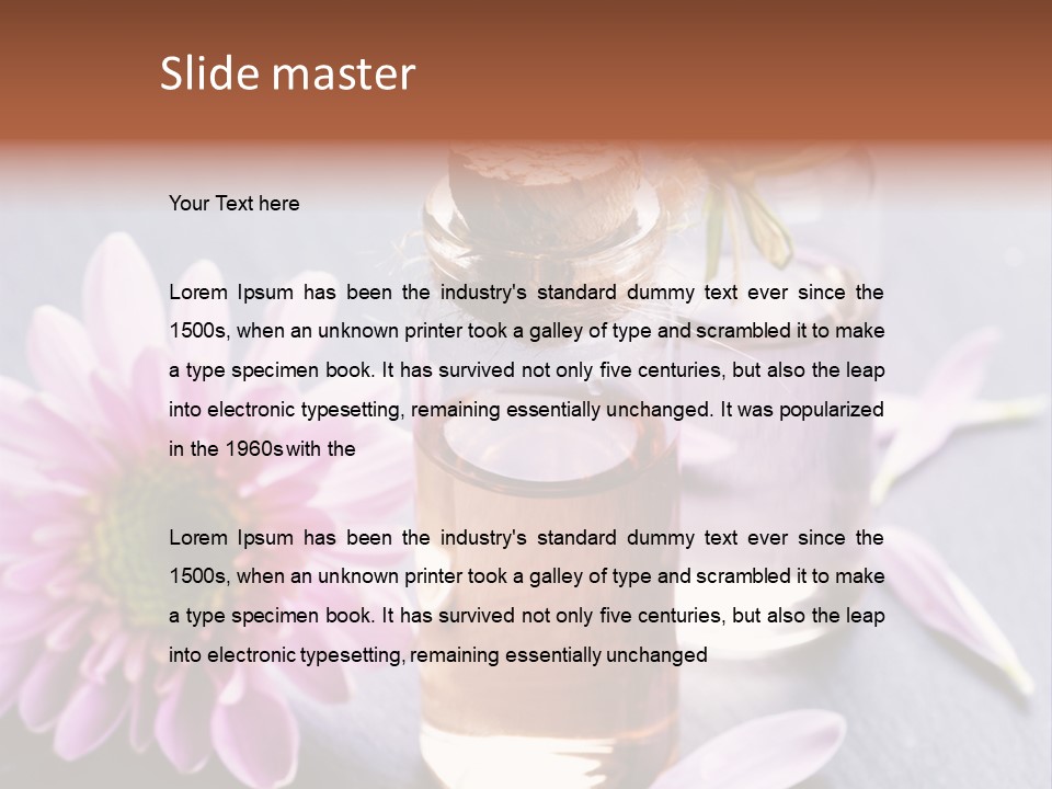 A Bottle Of Oil And A Flower On A Table PowerPoint Template