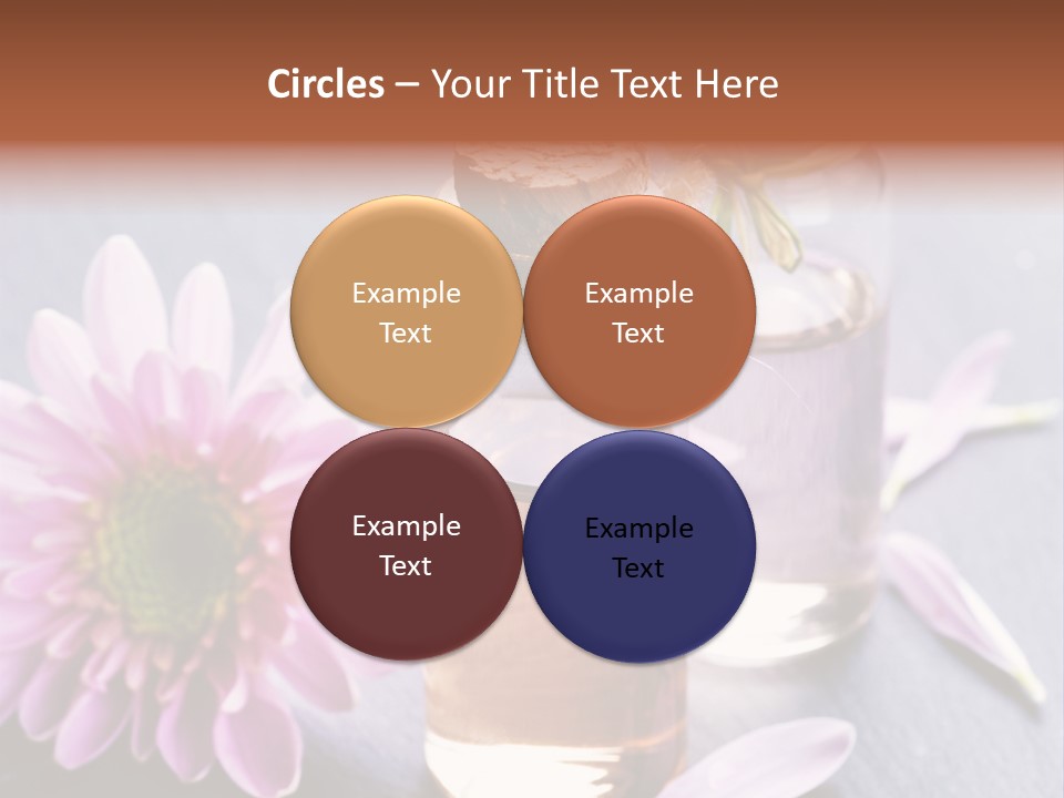 A Bottle Of Oil And A Flower On A Table PowerPoint Template