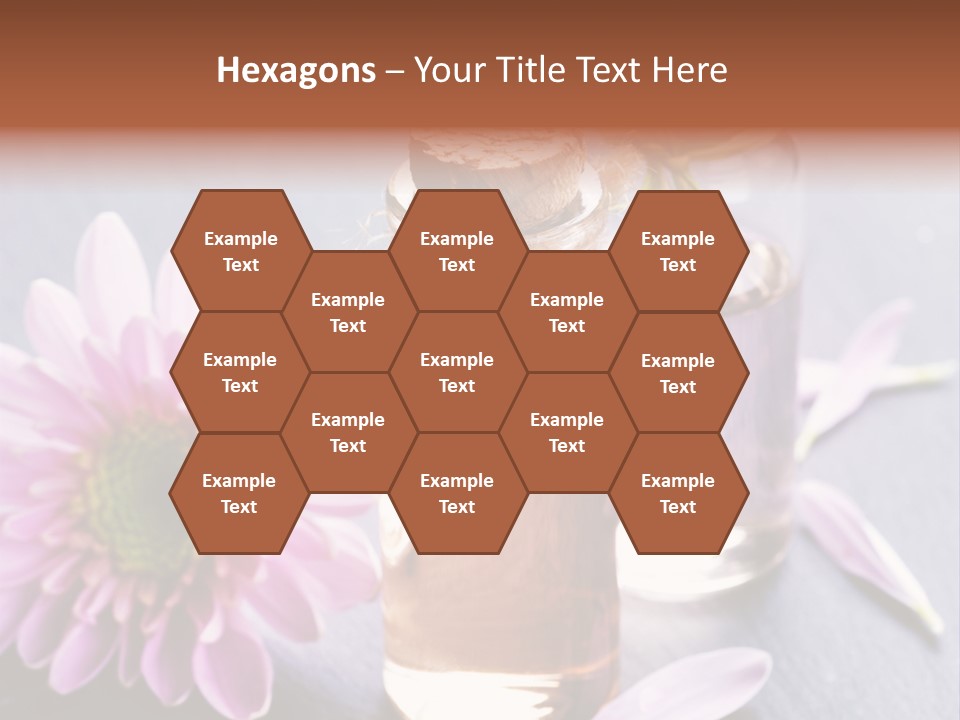 A Bottle Of Oil And A Flower On A Table PowerPoint Template