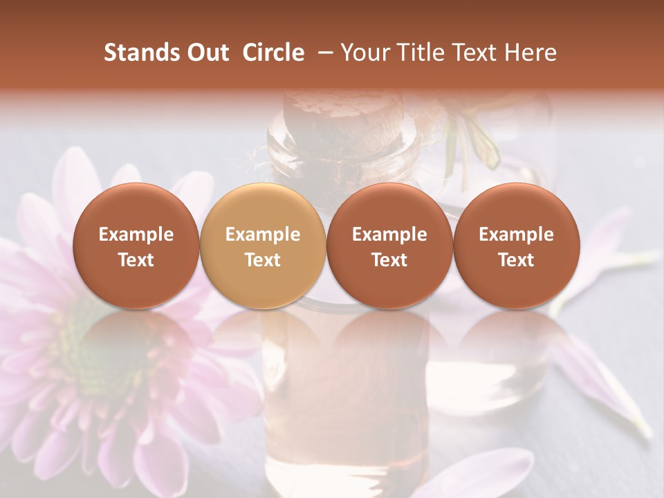 A Bottle Of Oil And A Flower On A Table PowerPoint Template