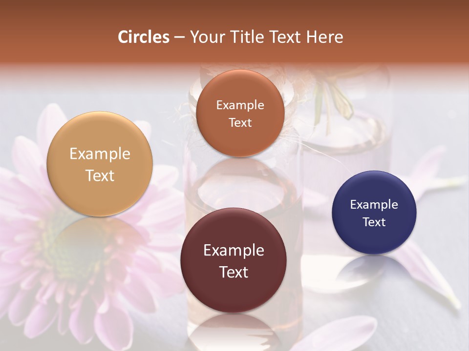 A Bottle Of Oil And A Flower On A Table PowerPoint Template