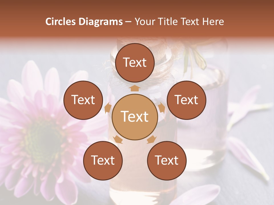 A Bottle Of Oil And A Flower On A Table PowerPoint Template