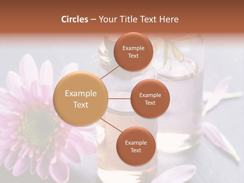 A Bottle Of Oil And A Flower On A Table PowerPoint Template