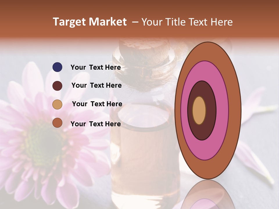 A Bottle Of Oil And A Flower On A Table PowerPoint Template