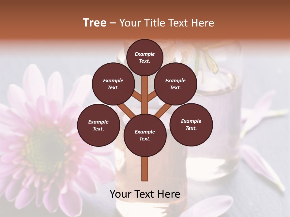 A Bottle Of Oil And A Flower On A Table PowerPoint Template