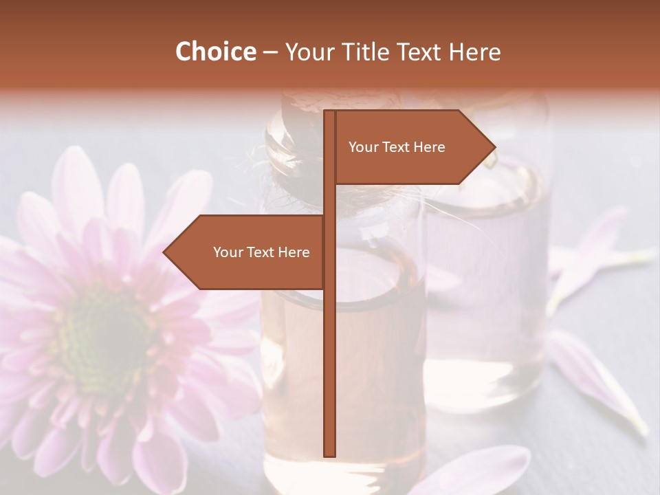 A Bottle Of Oil And A Flower On A Table PowerPoint Template