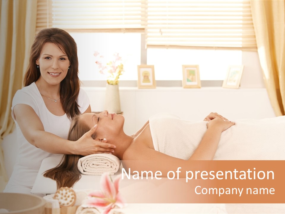 A Woman Receiving A Facial Massage From A Woman PowerPoint Template