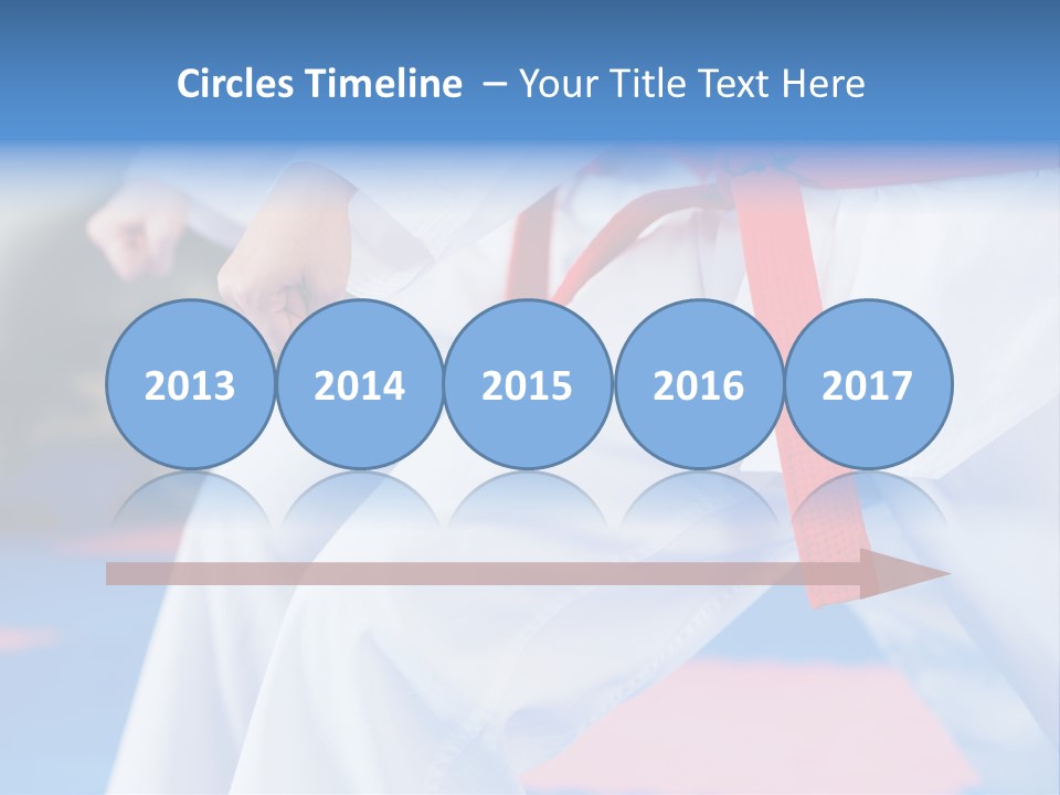 A Person In A Karate Stance With A Red Belt PowerPoint Template