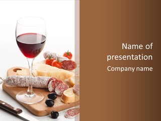 A Glass Of Wine And Bread On A Cutting Board PowerPoint Template