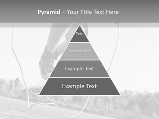 A Person Jumping In The Air With A Jump Rope PowerPoint Template
