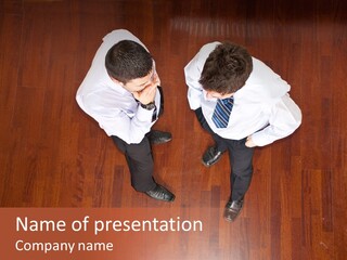 A Couple Of Men Sitting On Top Of A Wooden Floor PowerPoint Template