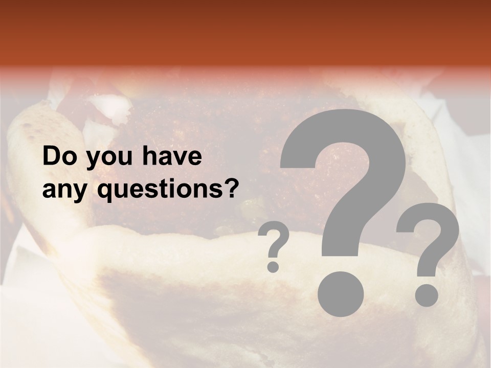 A Taco Filled With Meatballs On Top Of A Wrapper PowerPoint Template