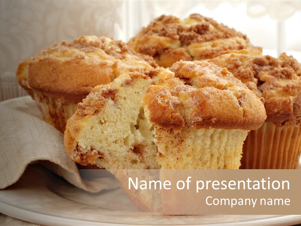 A White Plate Topped With Muffins On Top Of A Table PowerPoint Template